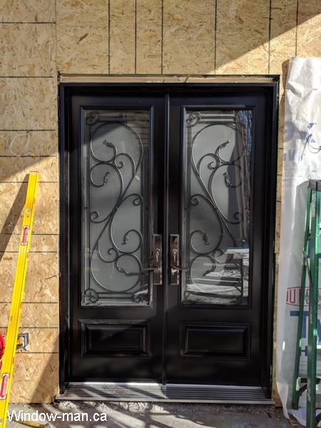 Double front insulated entry exterior doors. Custom house. Tall 8 foot door 96 inches high. Executive panels at the bottom. Traditional Flamingo bay design. Multi point lock lock